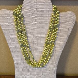 Handbeaded Necklace In Light Green Beads With Sage Green Faceted Stone Accents.